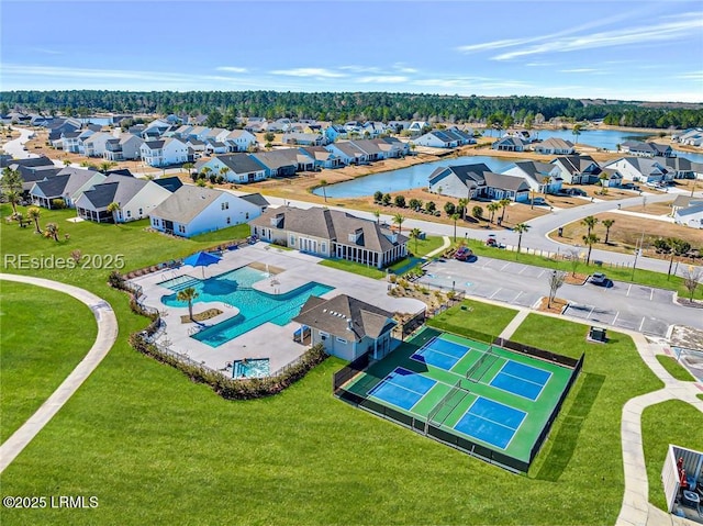 drone / aerial view with a water view