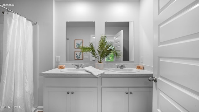 1444 Sanctum St, Ridgeland, SC 29936 - bathroom featuring double vanity and a shower with shower curtain