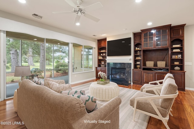 7 Fenwick Dr, Bluffton, SC 29909 - living area with plenty of natural light, baseboards, a ceiling fan, wood finished floors, and recessed lighting