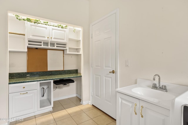 7 Fenwick Dr, Bluffton, SC 29909 - bathroom with a sink and tile patterned floors