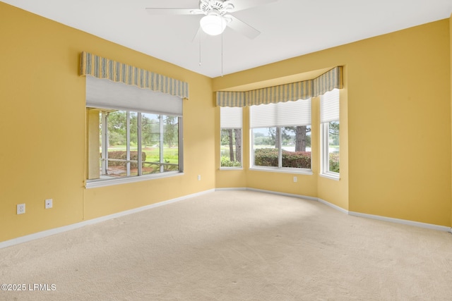 7 Fenwick Dr, Bluffton, SC 29909 - spare room with carpet, baseboards, and a ceiling fan