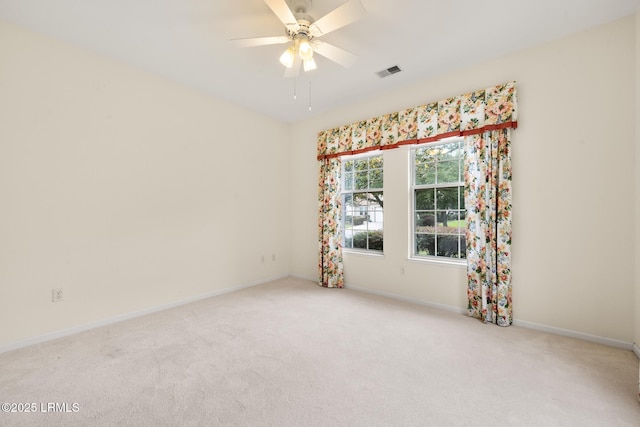 7 Fenwick Dr, Bluffton, SC 29909 - empty room featuring light colored carpet, baseboards, and ceiling fan