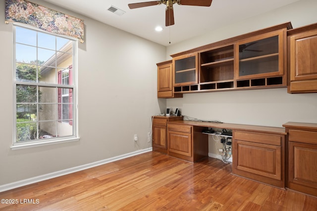 7 Fenwick Dr, Bluffton, SC 29909 - unfurnished office featuring light wood-style floors, healthy amount of natural light, a ceiling fan, and recessed lighting
