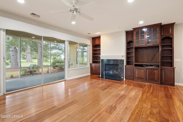 7 Fenwick Dr, Bluffton, SC 29909 - unfurnished living room with baseboards, recessed lighting, a ceiling fan, and light wood-type flooring