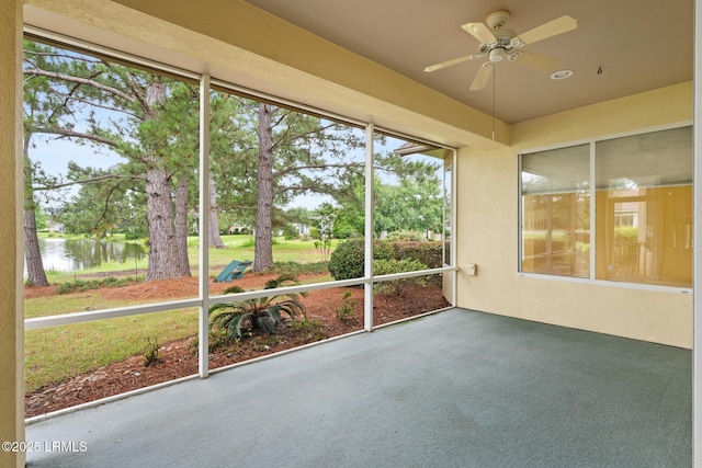 7 Fenwick Dr, Bluffton, SC 29909 - unfurnished sunroom featuring ceiling fan and a water view