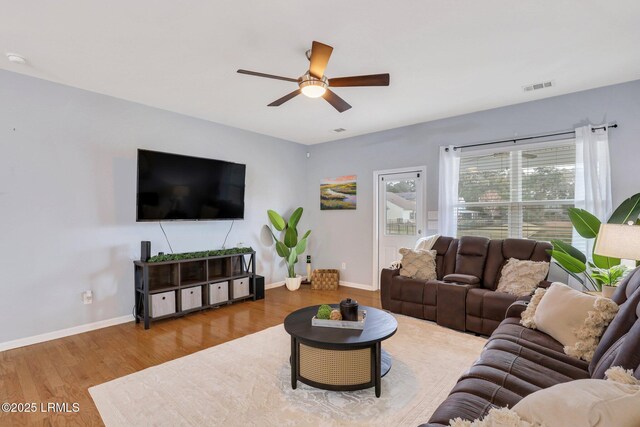 interior space featuring lofted ceiling, ceiling fan, and carpet flooring