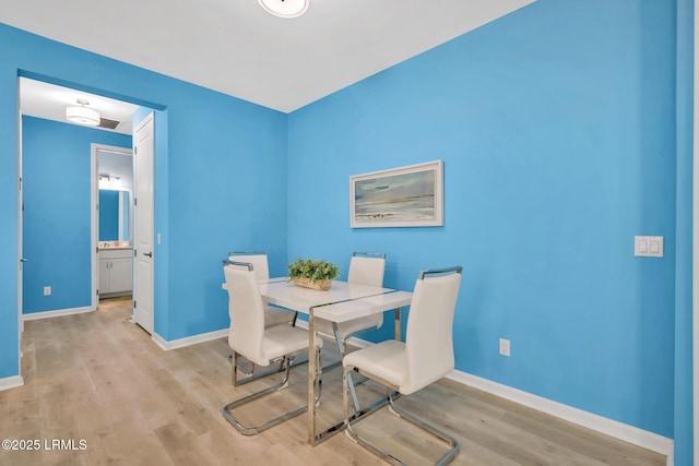 39 Island Breeze Ln Unit 102, Hardeeville, SC 29927 - dining space with wood finished floors and baseboards