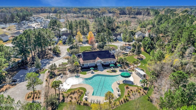 bird's eye view with a view of trees and a residential view