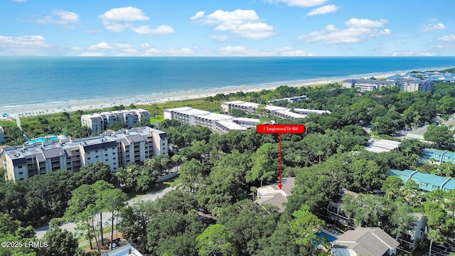 aerial view featuring a water view and a view of the beach