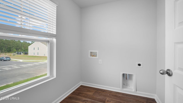 1493 Sanctum St, Ridgeland, SC 29936 - laundry area with hookup for an electric dryer, dark wood-style flooring, baseboards, and hookup for a washing machine