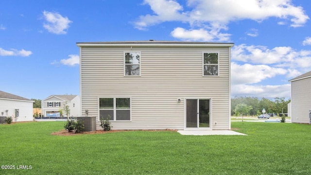1493 Sanctum St, Ridgeland, SC 29936 - back of house featuring a yard and central AC unit