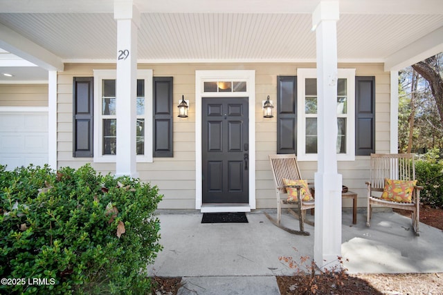 doorway to property with covered porch