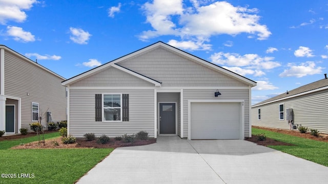 1530 Sanctum St, Ridgeland, SC 29936 - view of front facade featuring driveway, an attached garage, and a front yard