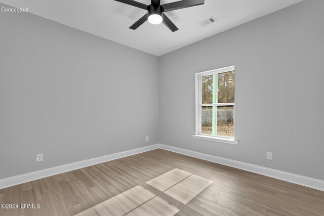 empty room with ceiling fan and wood-type flooring