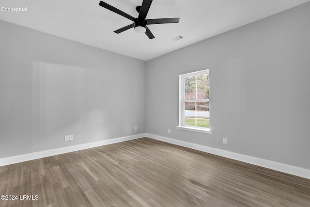 spare room featuring ceiling fan and wood-type flooring