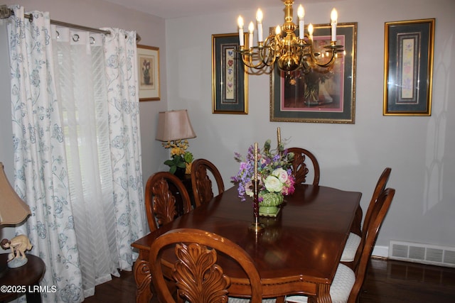110 Joey St, Hampton, SC 29924 - dining area with a chandelier, wood finished floors, and baseboards