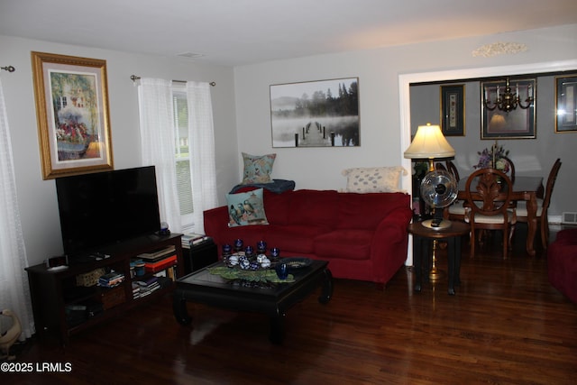 110 Joey St, Hampton, SC 29924 - living area featuring wood finished floors and a chandelier