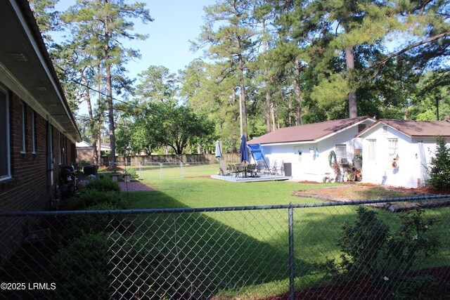 110 Joey St, Hampton, SC 29924 - view of yard featuring a patio, an outdoor structure, and a storage unit