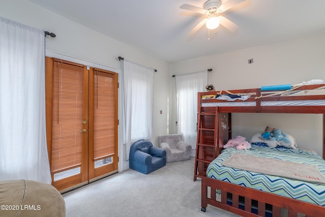 bedroom featuring carpet flooring, ceiling fan, and french doors