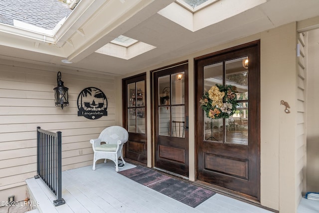 property entrance featuring covered porch