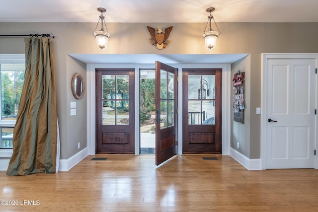 entrance foyer with light wood-type flooring