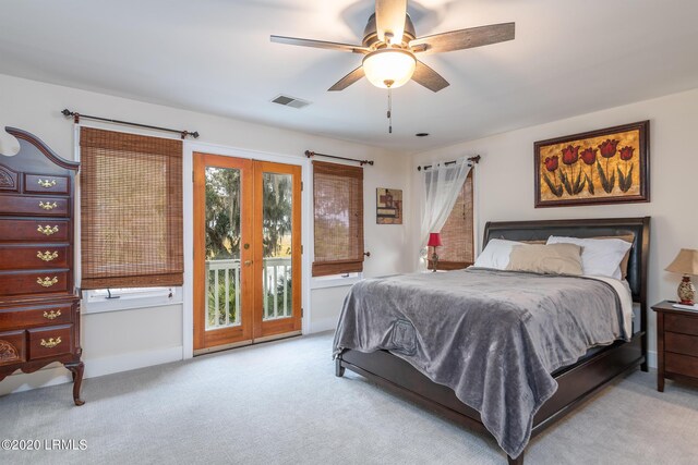 carpeted bedroom with access to outside and ceiling fan