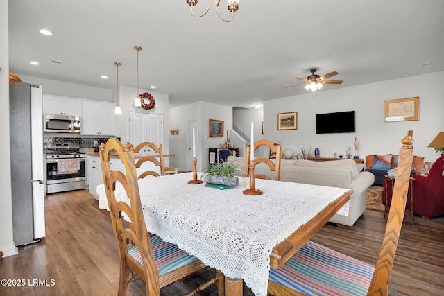 54 Great Bend Dr, Beaufort, SC 29906 - dining area featuring stairway, ceiling fan, recessed lighting, and wood finished floors