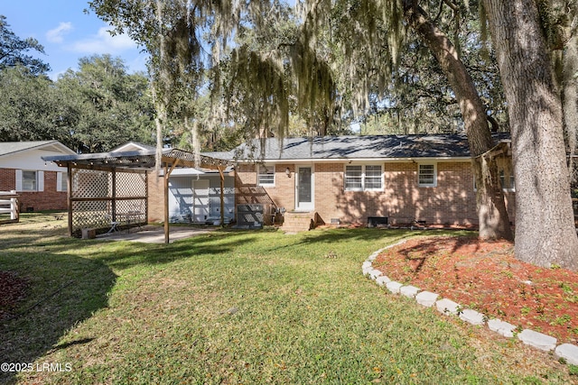 single story home with a garage and a front lawn