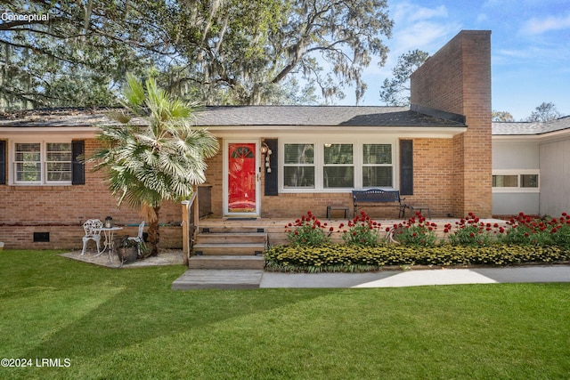 view of front of house featuring a front yard