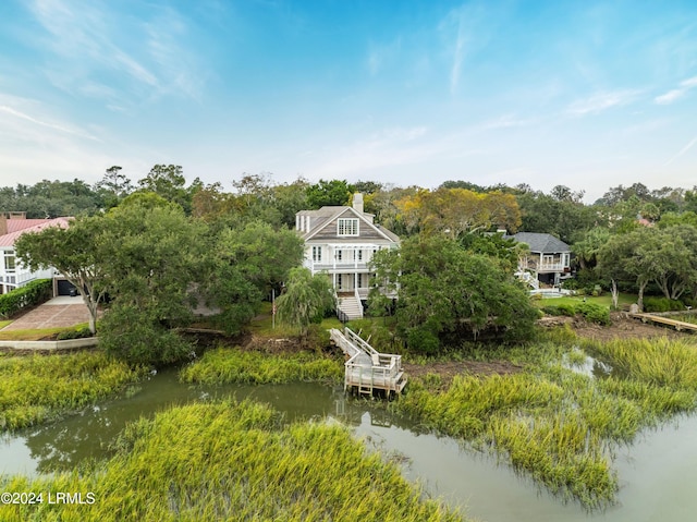 birds eye view of property featuring a water view