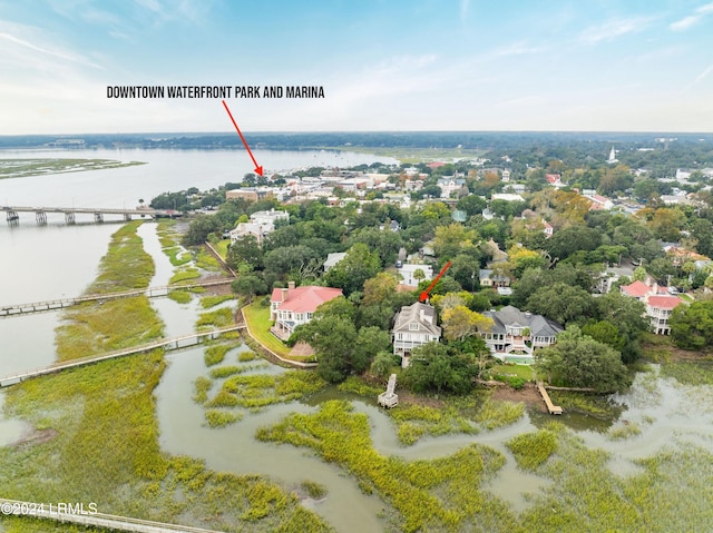 drone / aerial view with a water view