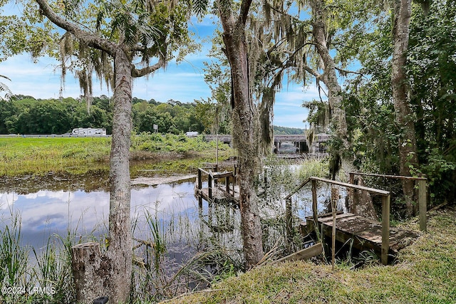 view of dock with a water view