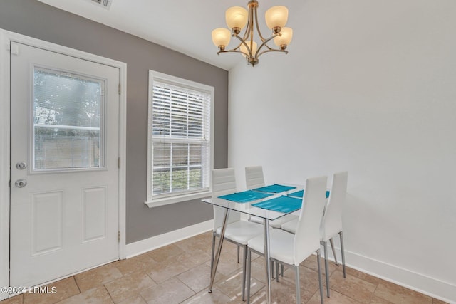 dining space with an inviting chandelier and a wealth of natural light