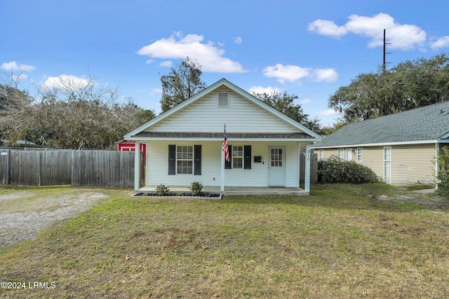 view of front of property with a front lawn and a porch