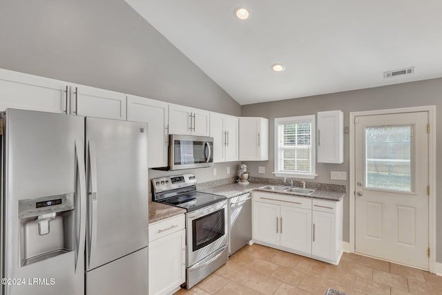 kitchen featuring white cabinetry, appliances with stainless steel finishes, and sink