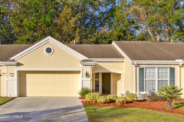 single story home with concrete driveway, a garage, stucco siding, and a shingled roof
