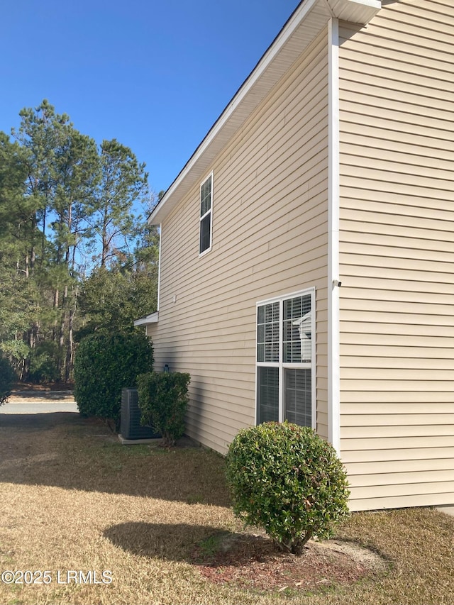 view of property exterior featuring central AC unit