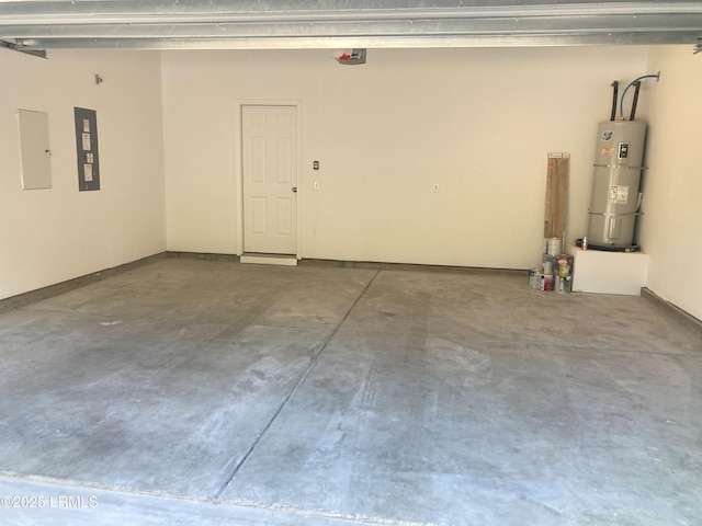 garage with strapped water heater, a garage door opener, and electric panel