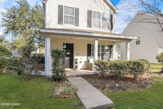 view of front of property with a front lawn