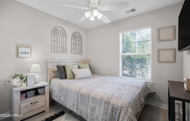 bedroom featuring hardwood / wood-style flooring and ceiling fan