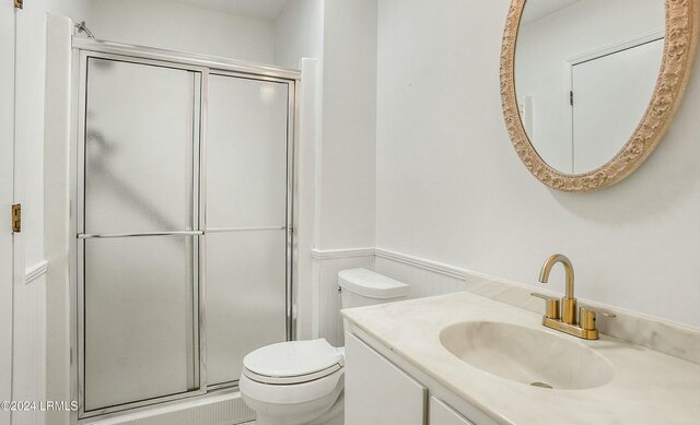 100 Thomas Sumter St, Beaufort, SC 29907 - full bath featuring a stall shower, wainscoting, and vanity