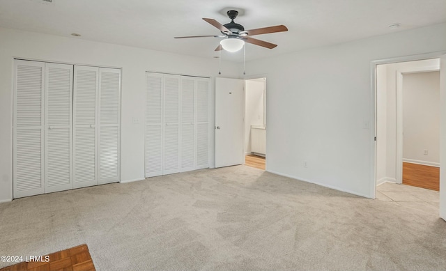 100 Thomas Sumter St, Beaufort, SC 29907 - unfurnished bedroom with two closets, carpet floors, and ceiling fan