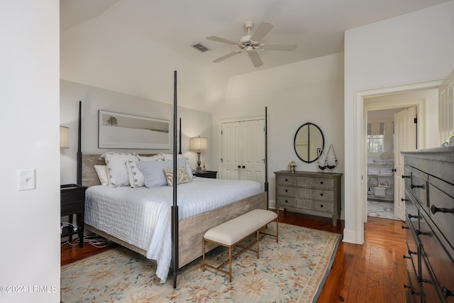 bedroom featuring lofted ceiling, hardwood / wood-style floors, ceiling fan, and a closet