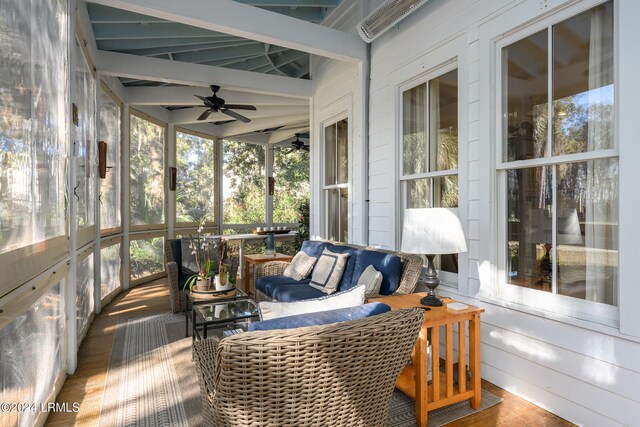 sunroom with ceiling fan