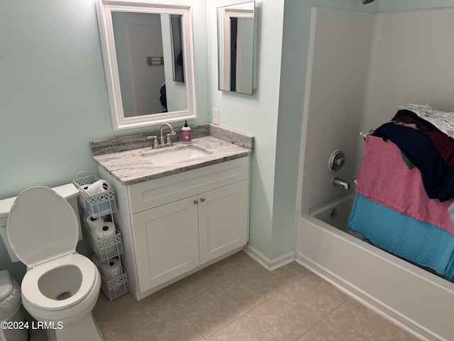 full bathroom with vanity, tile patterned floors, shower / bathtub combination, and toilet