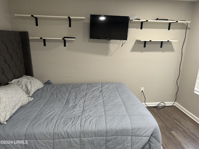 bedroom featuring hardwood / wood-style floors