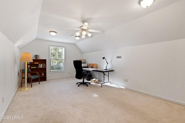 office area featuring baseboards, a ceiling fan, carpet floors, visible vents, and lofted ceiling