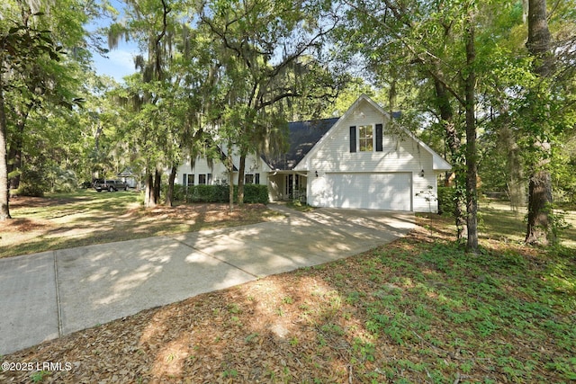 view of front of home featuring concrete driveway