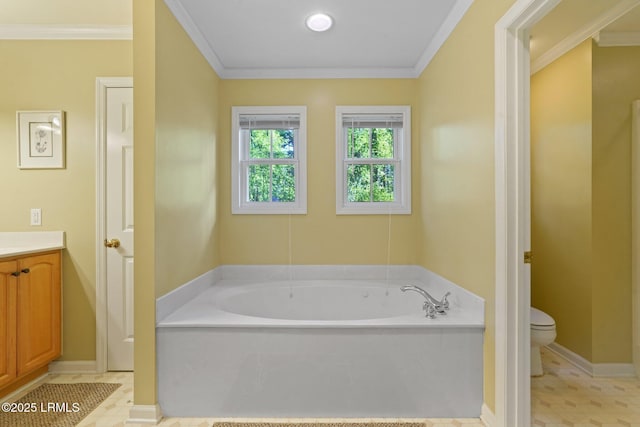 full bath featuring ornamental molding, toilet, and a garden tub