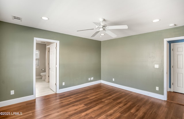 unfurnished room featuring hardwood / wood-style flooring and ceiling fan